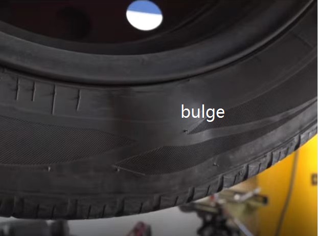 Tire with bulge